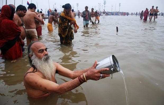 Taking Bath in Ganga Sagar in Makar Sankranti